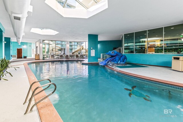 28105 Perdido Beach Blvd Unit C-314, Orange Beach, AL 36561 - pool with a water slide and a skylight
