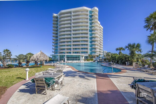 28105 Perdido Beach Blvd Unit C-314, Orange Beach, AL 36561 - community pool featuring a lawn and a patio area