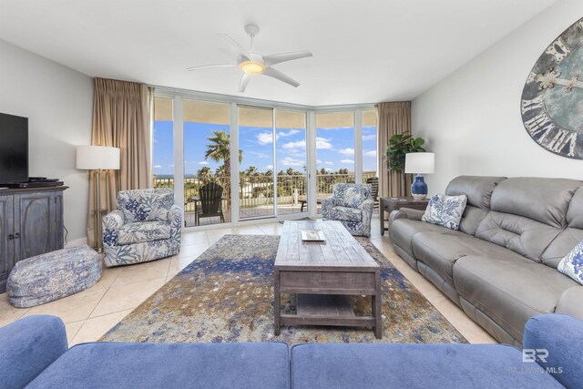 28105 Perdido Beach Blvd Unit C-314, Orange Beach, AL 36561 - living area featuring a wall of windows, tile patterned floors, and a ceiling fan