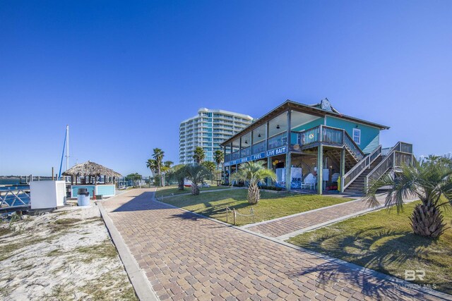 28105 Perdido Beach Blvd Unit C-314, Orange Beach, AL 36561 - view of community with stairs and a yard