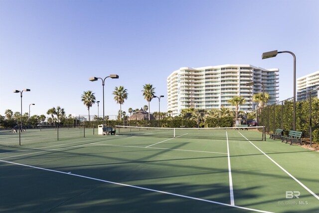 28105 Perdido Beach Blvd Unit C-314, Orange Beach, AL 36561 - view of tennis court featuring fence and community basketball court
