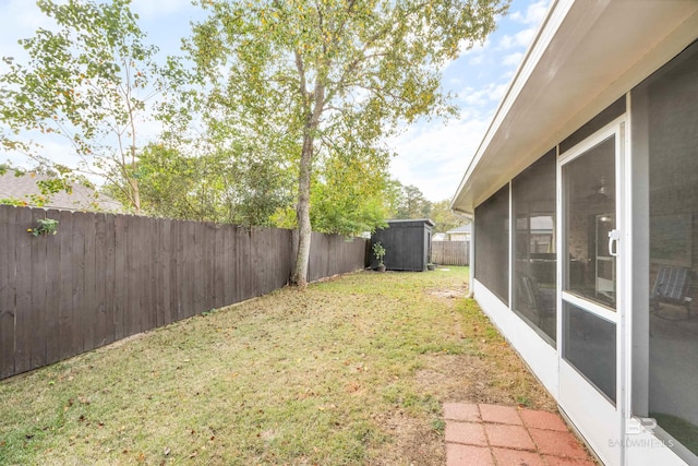 view of yard with a sunroom