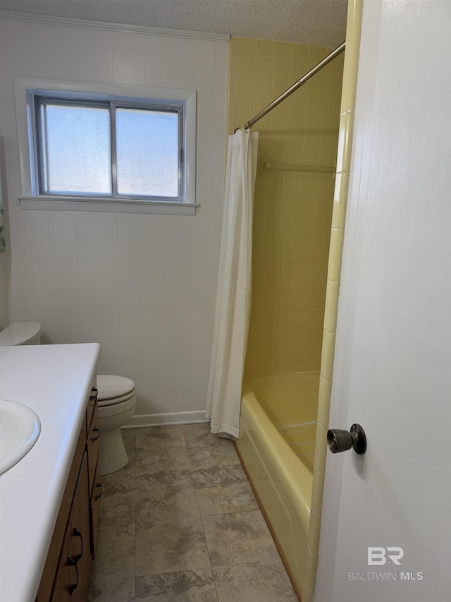 bathroom with toilet, shower / bath combo, a textured ceiling, and vanity
