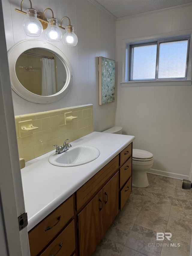 bathroom featuring crown molding, curtained shower, toilet, decorative backsplash, and vanity