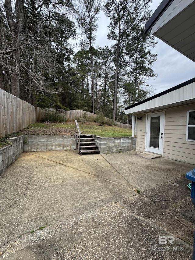 view of patio with fence