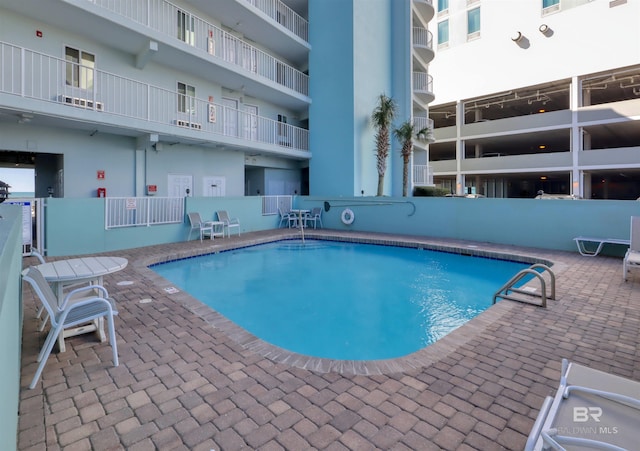 pool with a patio area