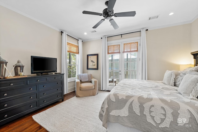 25773 Canal Rd Unit 28, Orange Beach, AL 36561 - bedroom with visible vents, access to exterior, dark wood finished floors, and crown molding