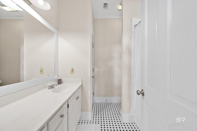 25773 Canal Rd Unit 28, Orange Beach, AL 36561 - bathroom featuring visible vents, curtained shower, vanity, and baseboards