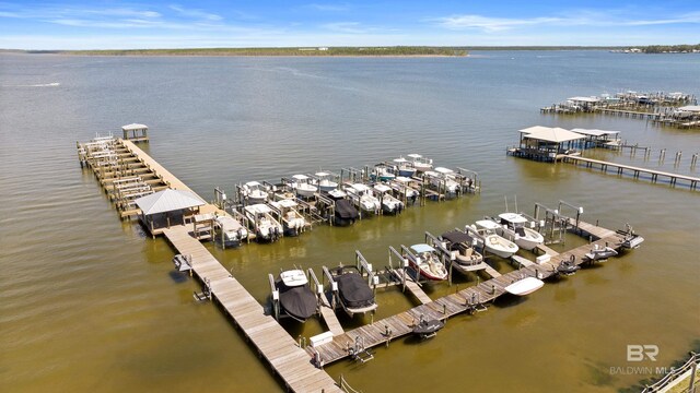 25773 Canal Rd Unit 28, Orange Beach, AL 36561 - view of dock featuring a water view and boat lift