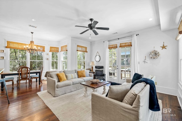 25773 Canal Rd Unit 28, Orange Beach, AL 36561 - living room featuring visible vents, dark wood-type flooring, baseboards, recessed lighting, and ceiling fan with notable chandelier