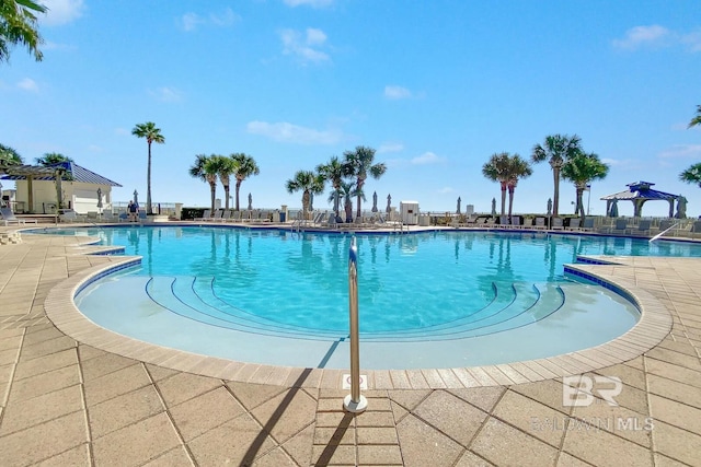 pool with a patio