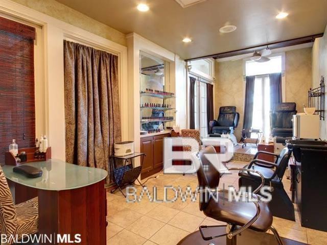 office space with recessed lighting and light tile patterned floors