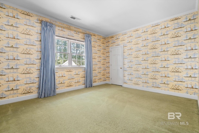 carpeted spare room with ornamental molding