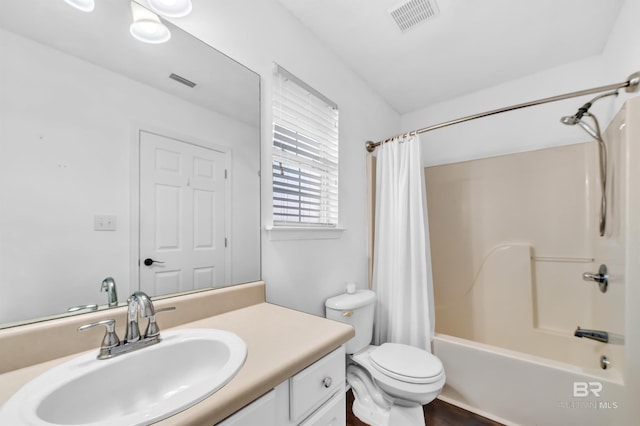 full bathroom with visible vents, toilet, vanity, and shower / bathtub combination with curtain