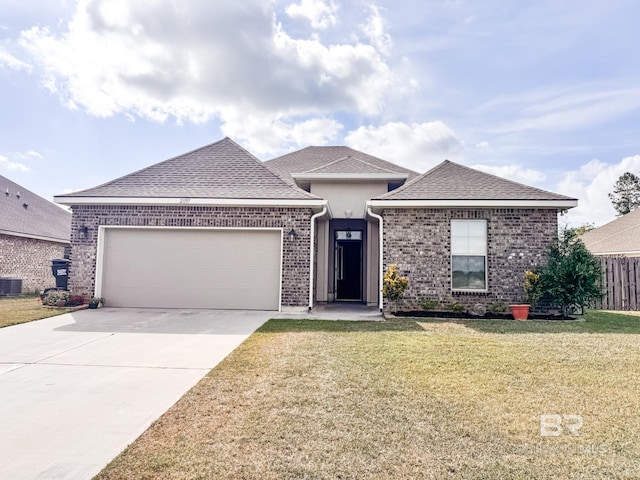 single story home with fence, an attached garage, central AC, driveway, and a front yard
