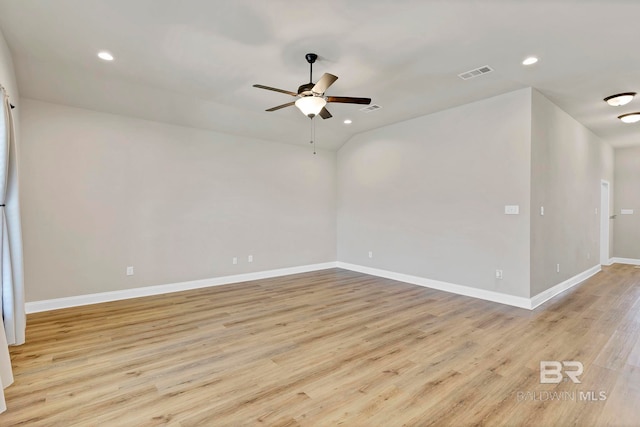 empty room featuring visible vents, recessed lighting, light wood finished floors, a ceiling fan, and baseboards