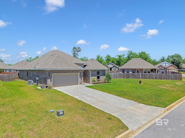single story home featuring brick siding, fence, cooling unit, a garage, and a front lawn