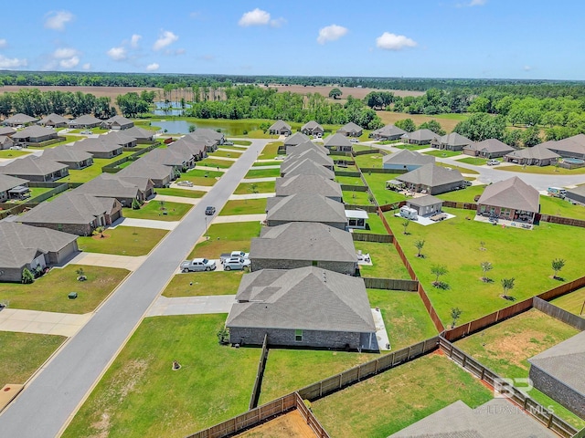 bird's eye view with a water view and a residential view