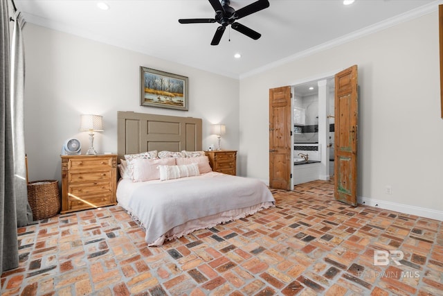 bedroom with crown molding, ceiling fan, and ensuite bathroom