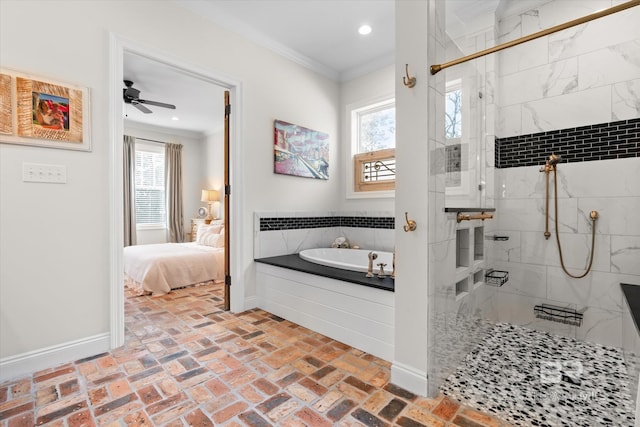 bathroom with crown molding and independent shower and bath