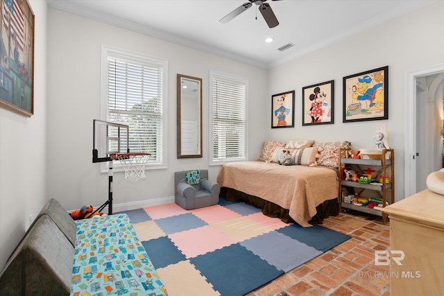 bedroom featuring ornamental molding and ceiling fan