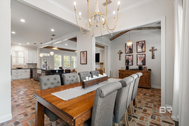 dining area featuring an inviting chandelier, crown molding, beverage cooler, and beamed ceiling