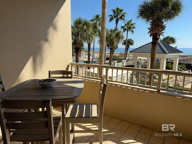 balcony featuring a water view