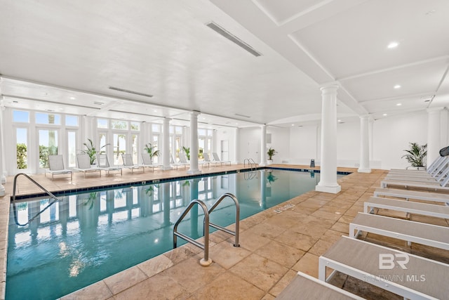 view of pool featuring ornate columns