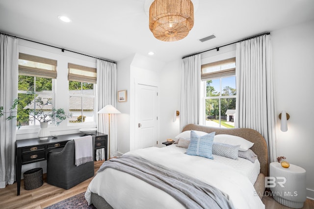 bedroom featuring light hardwood / wood-style flooring