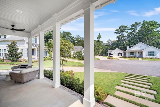 view of patio / terrace featuring ceiling fan and covered porch