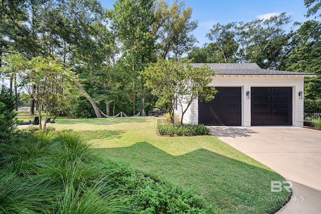 view of yard with a garage