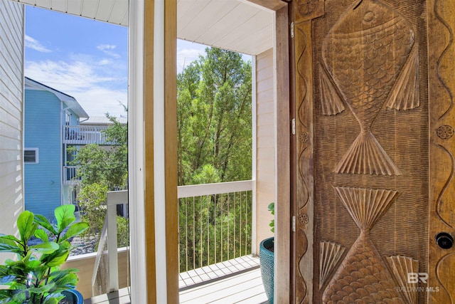 7166 Sharp Reef, Pensacola, FL 32507 - doorway to outside featuring plenty of natural light
