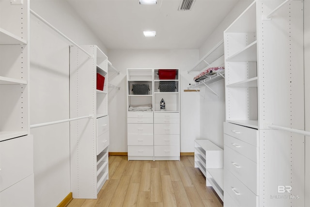 7166 Sharp Reef, Pensacola, FL 32507 - spacious closet featuring light wood-style flooring