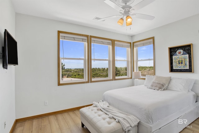7166 Sharp Reef, Pensacola, FL 32507 - bedroom with light wood-type flooring and a ceiling fan