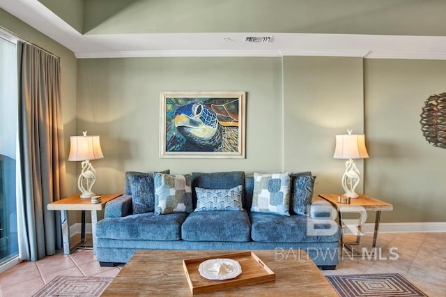 tiled living room with ornamental molding