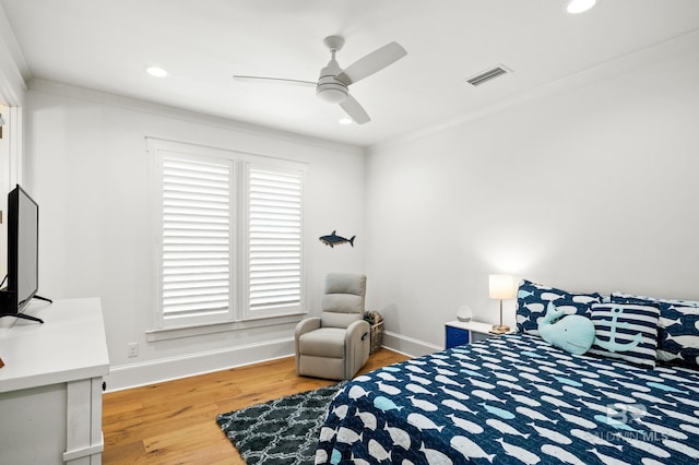 902 Inlet Cir, Gulf Shores, AL 36542 - bedroom with recessed lighting, wood finished floors, visible vents, and baseboards