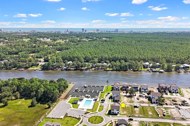 902 Inlet Cir, Gulf Shores, AL 36542 - bird's eye view featuring a wooded view and a water view