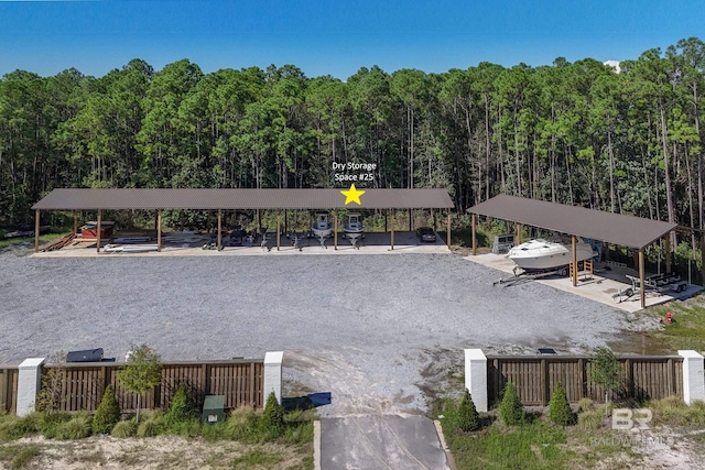 902 Inlet Cir, Gulf Shores, AL 36542 - view of community featuring fence and a wooded view