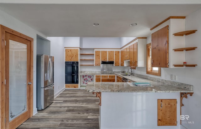 13450 County Road 91, Elberta, AL 36530 - kitchen with dark hardwood / wood-style floors, stainless steel fridge, kitchen peninsula, and double oven