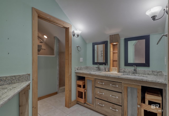 13450 County Road 91, Elberta, AL 36530 - bathroom featuring tile patterned flooring, vanity, and vaulted ceiling