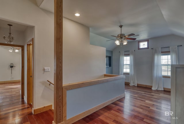 13450 County Road 91, Elberta, AL 36530 - interior space with dark hardwood / wood-style floors, vaulted ceiling, and a notable chandelier