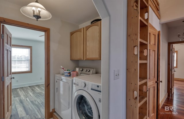 13450 County Road 91, Elberta, AL 36530 - laundry area with washing machine and dryer, cabinets, and dark hardwood / wood-style floors