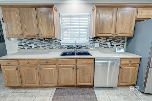 kitchen featuring sink, light tile patterned floors, backsplash, and stainless steel appliances