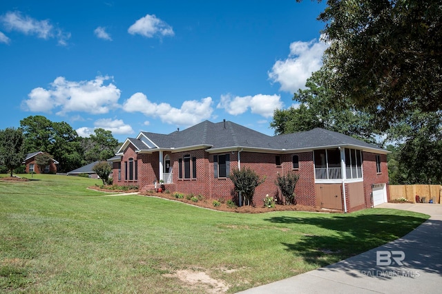 single story home with a garage and a front yard