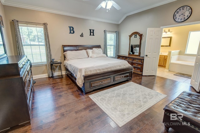 bedroom with ceiling fan, crown molding, dark hardwood / wood-style flooring, and lofted ceiling