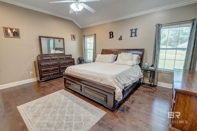 bedroom with dark hardwood / wood-style floors, vaulted ceiling, crown molding, and ceiling fan