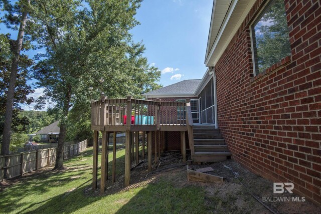 view of yard featuring a wooden deck