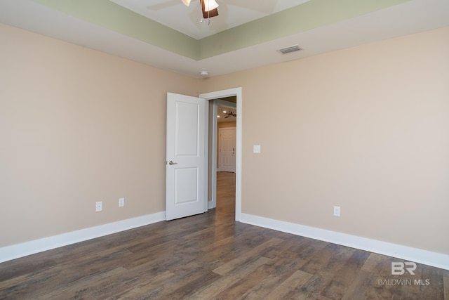 211 Lakefront Cir, Summerdale, AL 36580 - unfurnished room with ceiling fan, dark wood-style floors, baseboards, and a smoke detector