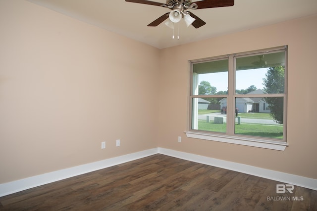 211 Lakefront Cir, Summerdale, AL 36580 - empty room featuring baseboards, dark wood-style floors, and a ceiling fan
