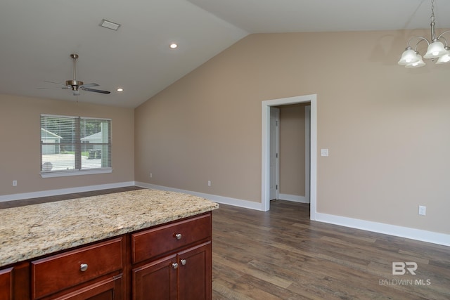 211 Lakefront Cir, Summerdale, AL 36580 - kitchen with a chandelier, vaulted ceiling, dark wood finished floors, a ceiling fan, and pendant lighting
